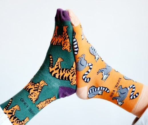 Bare Kind's tiger and lemur socks on feet