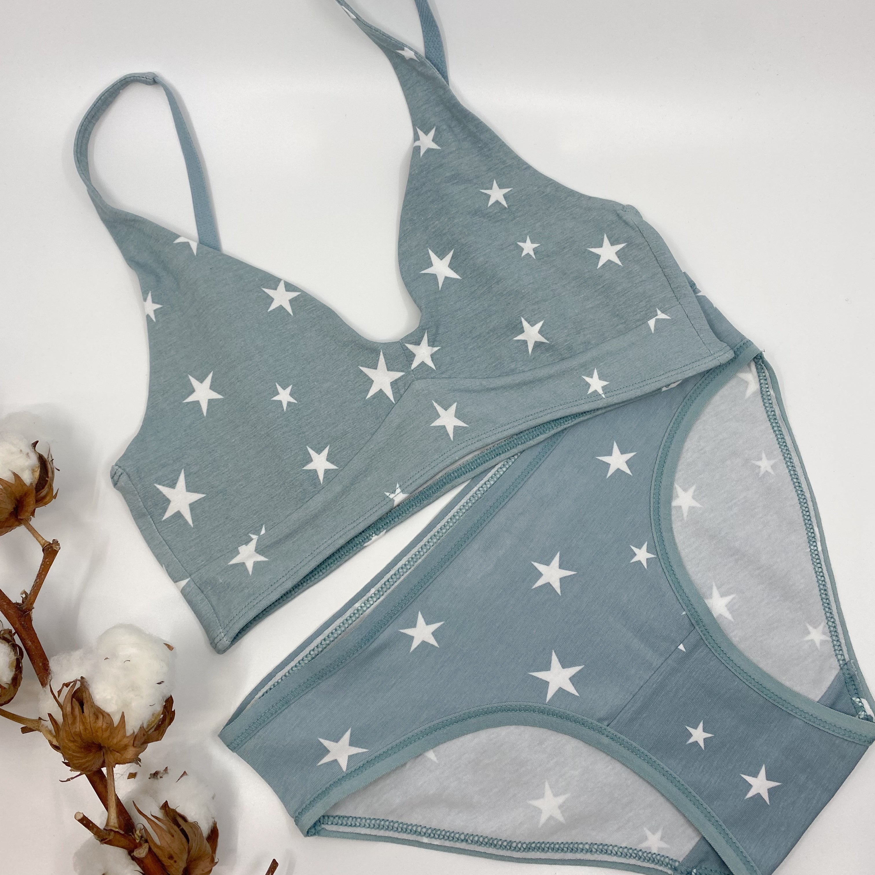 Women's organic cotton matching bralette and low-rise bikini set - blue with white stars pattern