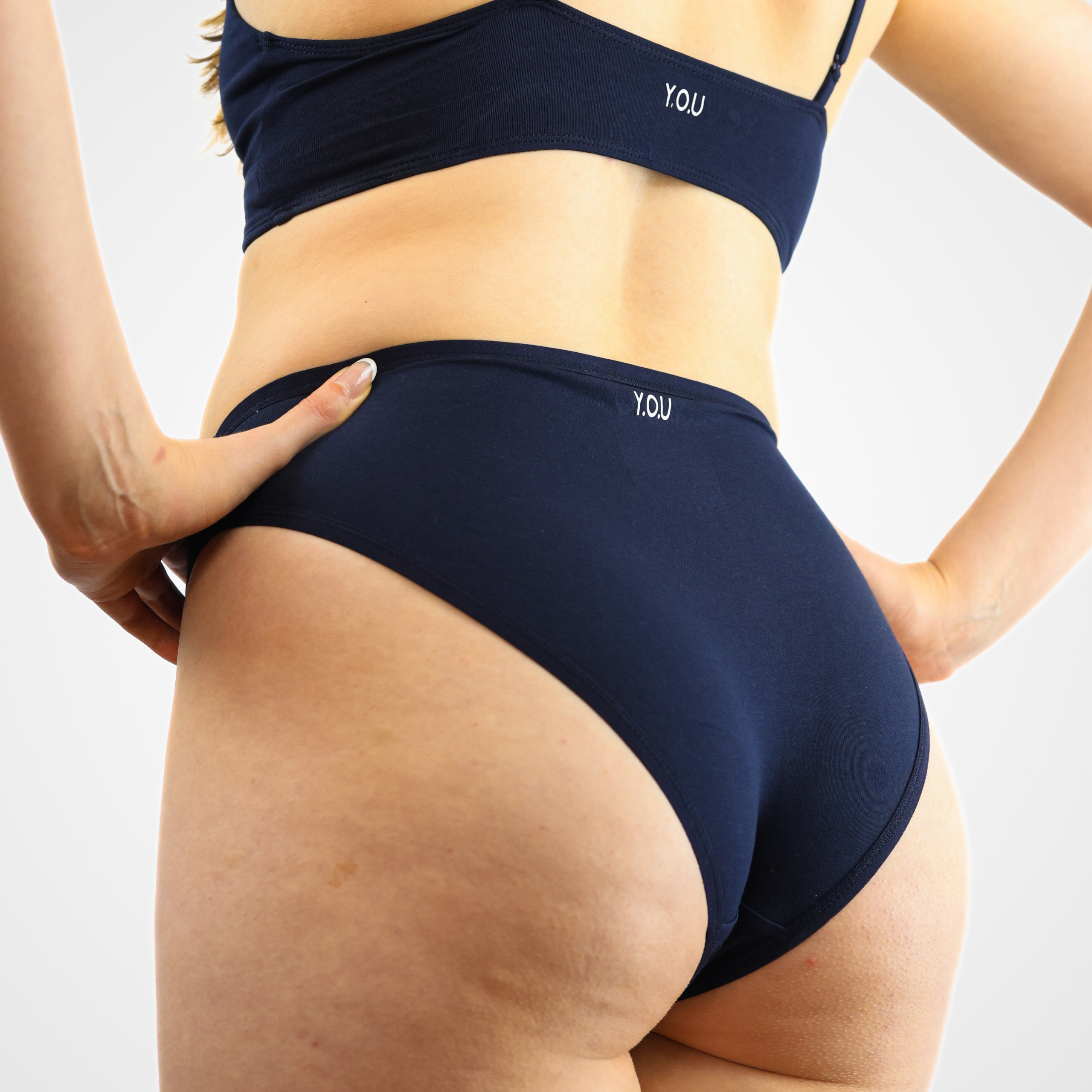 Women's organic cotton mid-rise bikini bottoms in navy blue