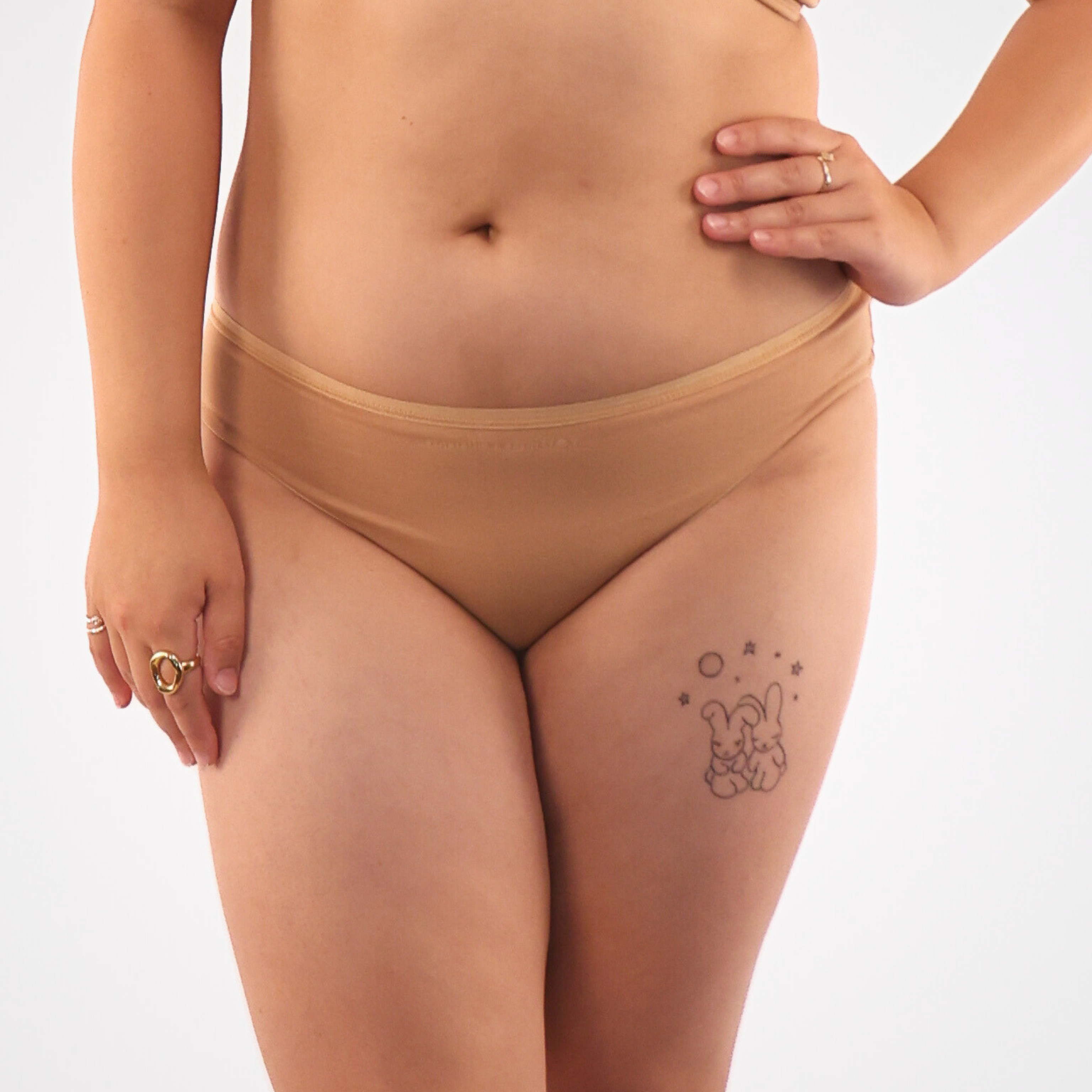 Women's organic cotton low-rise bikini bottoms in almond (light nude)